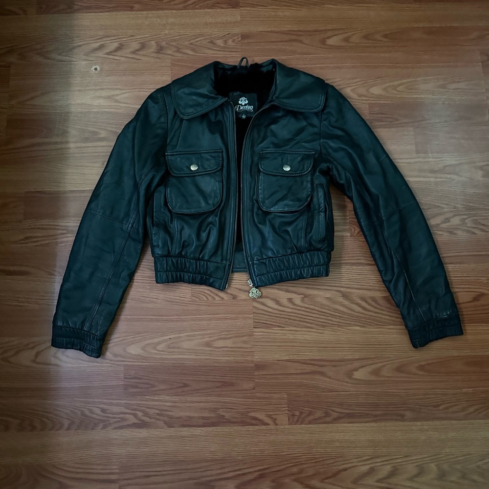 Deréon leather jacket with a gold embroidered logo